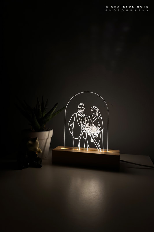Bride and Groom Custom Line Drawing lit with LED light wood base as a night stand lamp