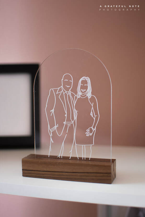 Custom Minimalist Portrait engraved on Clear 3mm Acrylic Frame with Dark Wood Stand