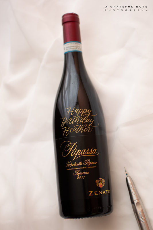Ripassa Red Wine Bottle Hand Lettered Engraving with quote "Happy Birthday Heather"; filled with gold Rub n' Buff.